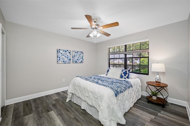 bedroom featuring dark hardwood / wood-style floors and ceiling fan