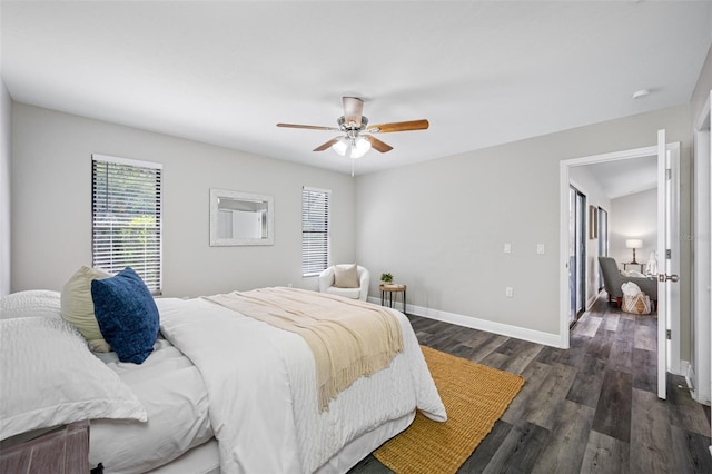 bedroom featuring dark hardwood / wood-style flooring and ceiling fan