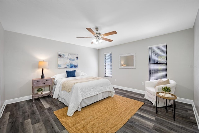 bedroom featuring ceiling fan and dark hardwood / wood-style flooring