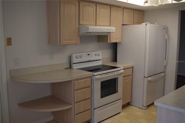 kitchen with light brown cabinetry and white appliances