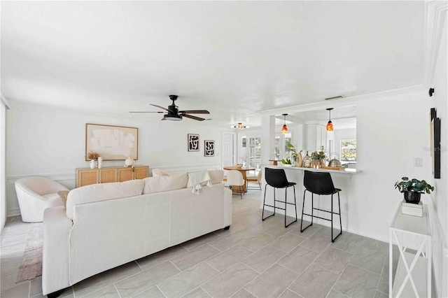 living room with ceiling fan