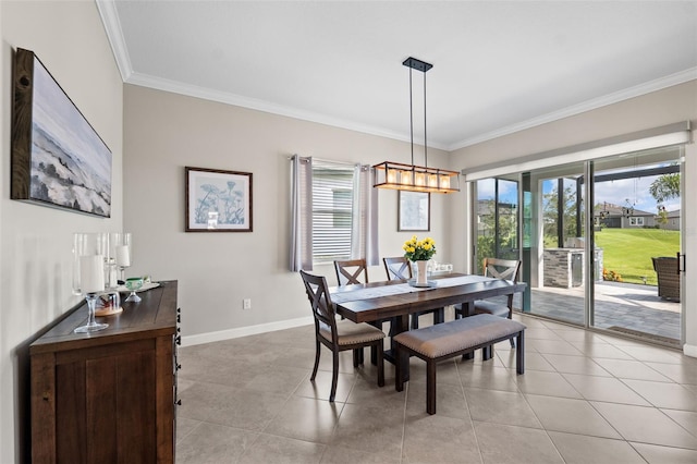 dining space featuring light tile patterned flooring and crown molding