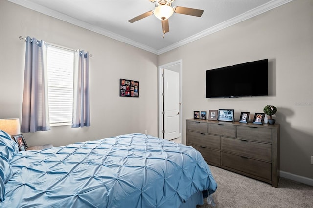 bedroom with ceiling fan, light carpet, and crown molding