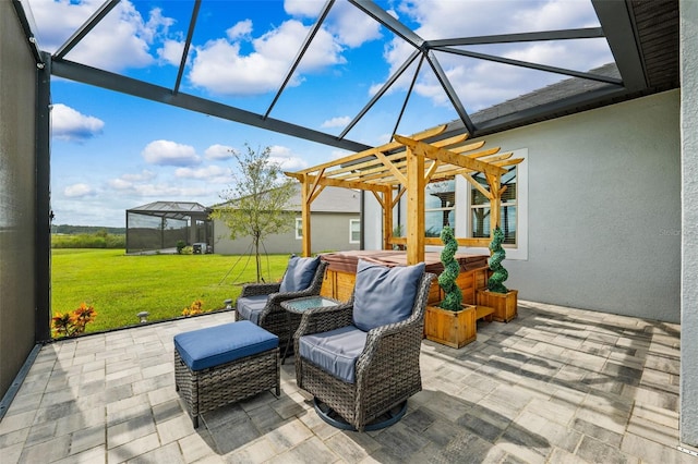 view of patio / terrace with a pergola, a hot tub, and a lanai