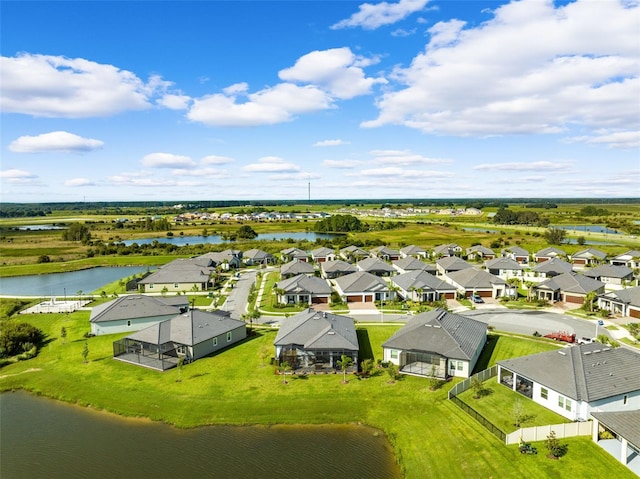 drone / aerial view featuring a water view