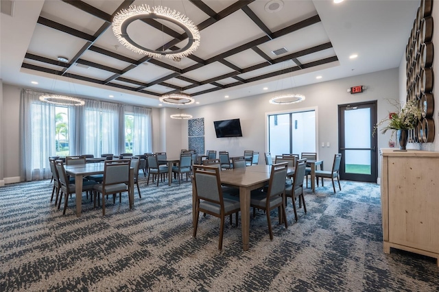 dining area featuring dark carpet, beam ceiling, a notable chandelier, and coffered ceiling