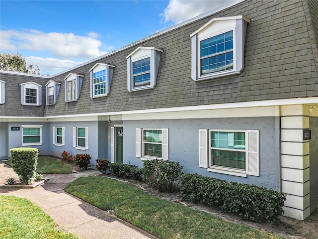 view of property with a front yard