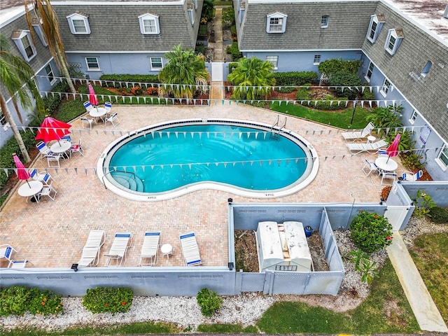 view of swimming pool featuring a patio