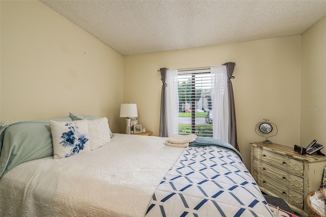 bedroom featuring a textured ceiling