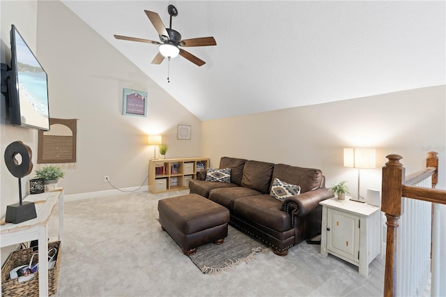 living area featuring light carpet, high vaulted ceiling, ceiling fan, and baseboards