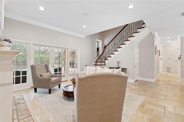 living area featuring baseboards, visible vents, stairway, ornamental molding, and stone tile flooring