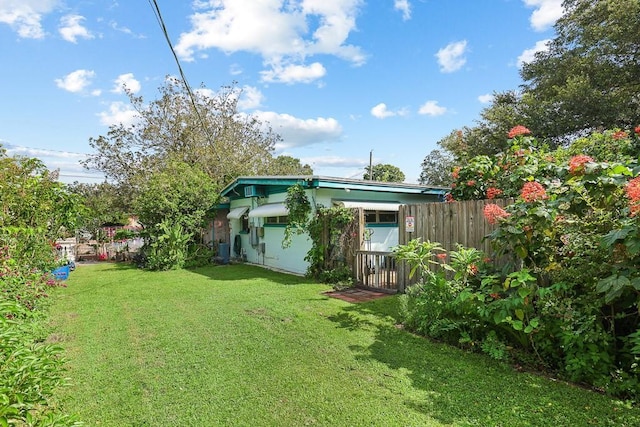 view of yard with fence