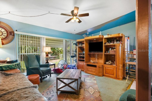 living room with lofted ceiling and ceiling fan