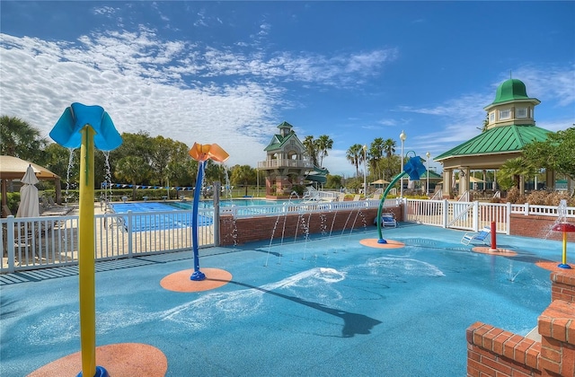 view of community featuring a pool and a gazebo