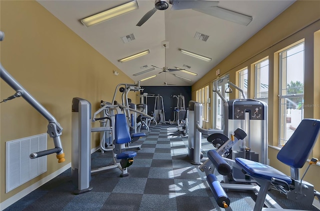 gym featuring ceiling fan and vaulted ceiling