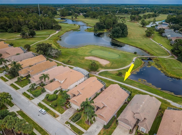 bird's eye view with a water view, a residential view, and golf course view