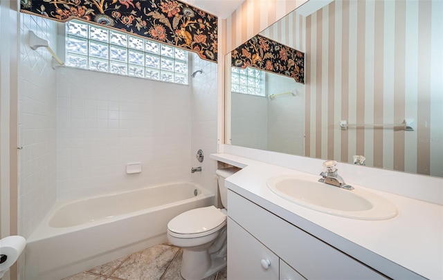 full bathroom featuring toilet, bathtub / shower combination, vanity, and wallpapered walls