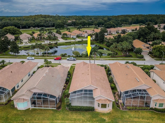 aerial view with a residential view and a water view