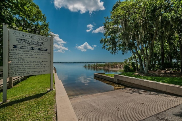 dock area featuring a water view