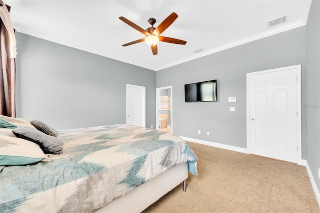 carpeted bedroom featuring ensuite bathroom, ceiling fan, baseboards, ornamental molding, and visible vents