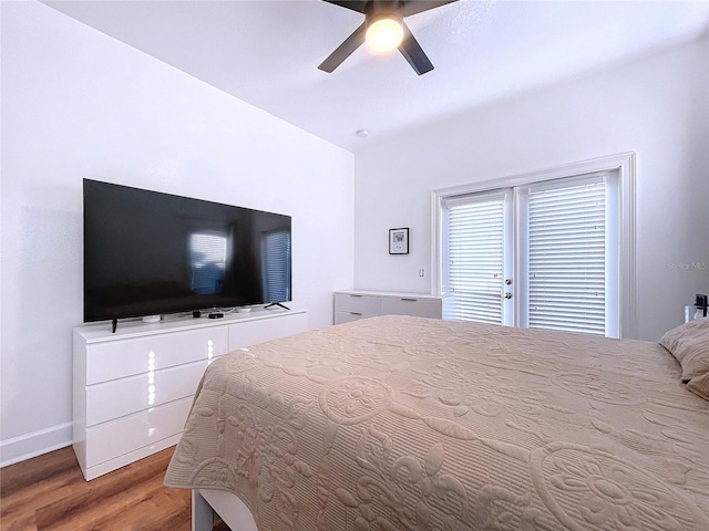 bedroom featuring ceiling fan and hardwood / wood-style flooring