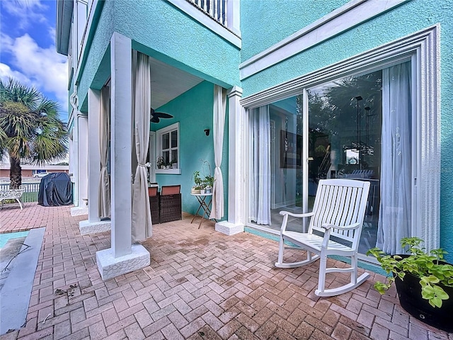 view of patio / terrace with ceiling fan