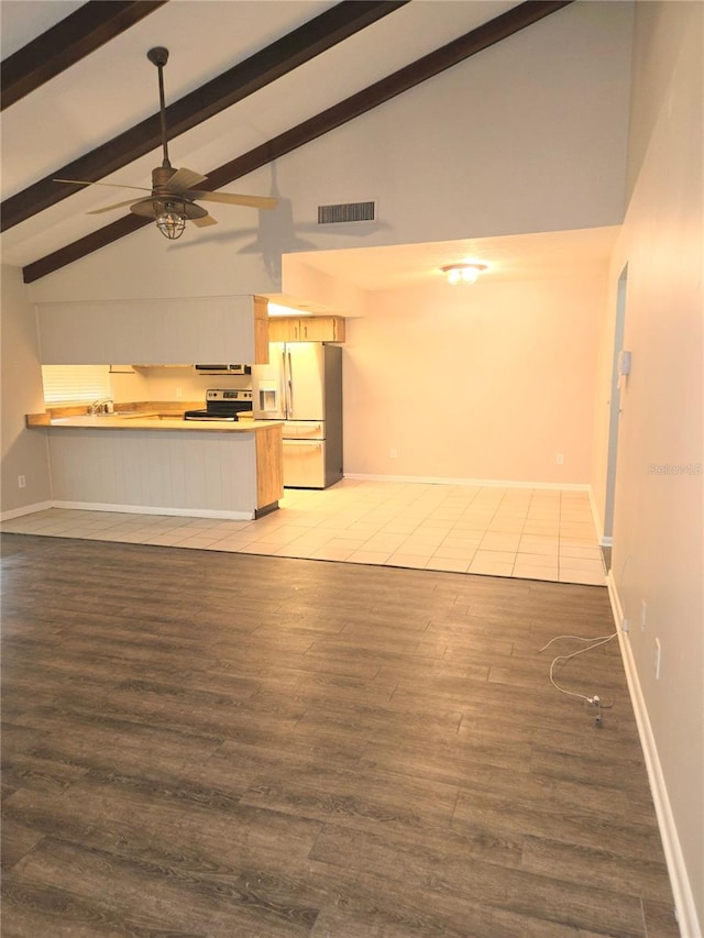 unfurnished living room with high vaulted ceiling, wood-type flooring, beam ceiling, and ceiling fan