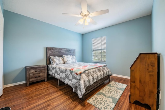 bedroom featuring wood-type flooring and ceiling fan