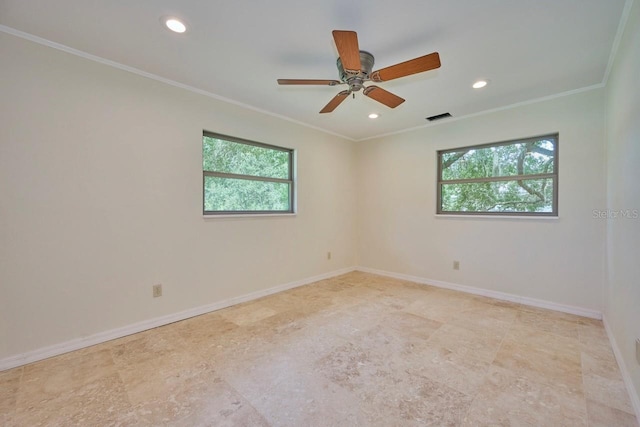 empty room with ceiling fan and ornamental molding