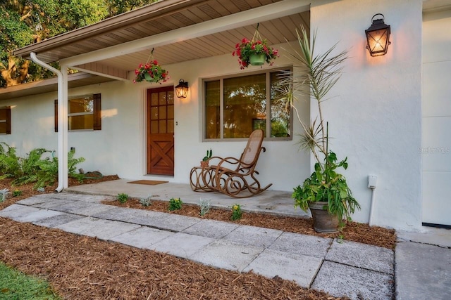 property entrance with a porch