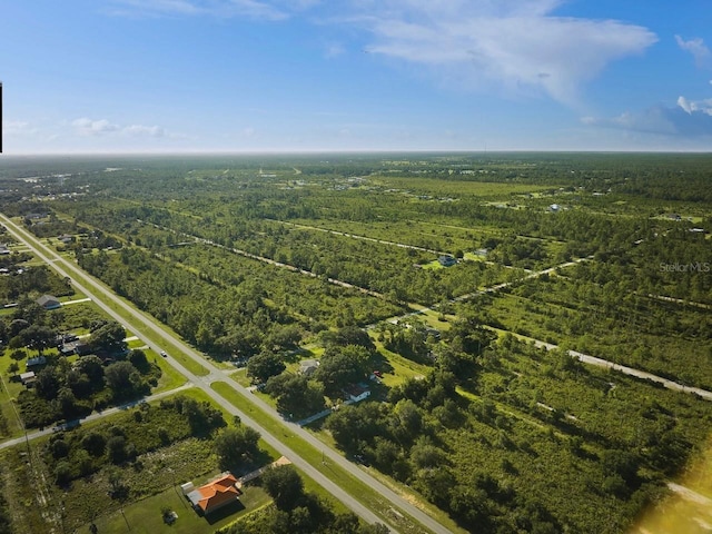 bird's eye view featuring a forest view