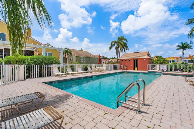 43 Bayview Ct S # A, Saint Petersburg, FL 33711 - community pool featuring a residential view and a patio