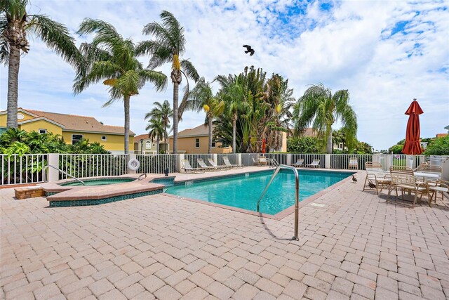 43 Bayview Ct S # A, Saint Petersburg, FL 33711 - community pool with a patio and a community hot tub