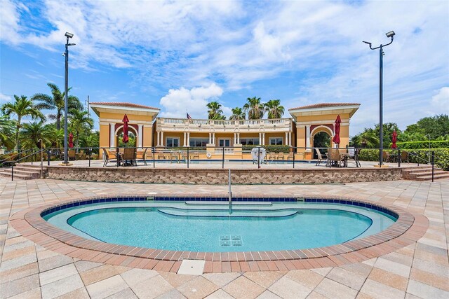 43 Bayview Ct S # A, Saint Petersburg, FL 33711 - community pool featuring a patio area