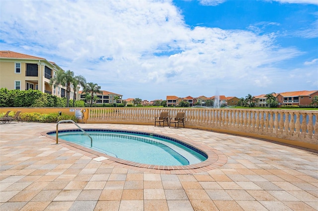43 Bayview Ct S # A, Saint Petersburg, FL 33711 - view of pool with a residential view, a patio, and a swimming pool