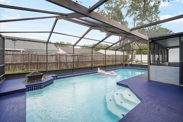 view of pool featuring a lanai and a patio area