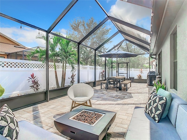 view of patio / terrace with a fire pit and area for grilling