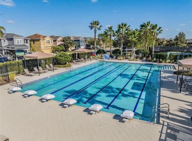 view of swimming pool with a deck