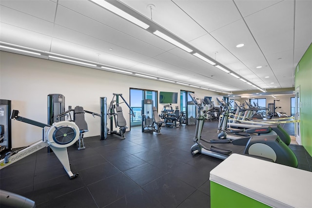 gym featuring recessed lighting and plenty of natural light