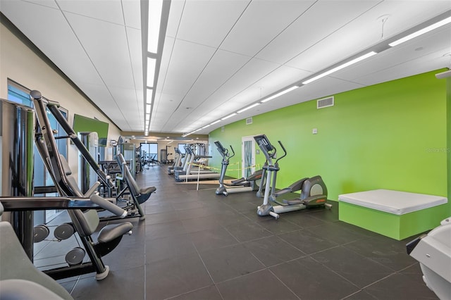 workout area featuring visible vents