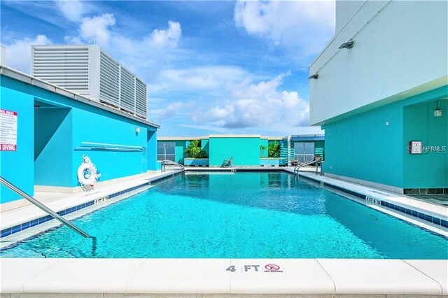 view of pool featuring a patio area