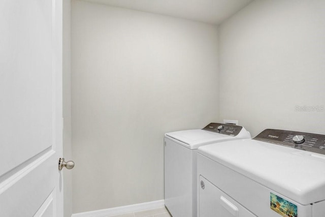 laundry area with separate washer and dryer