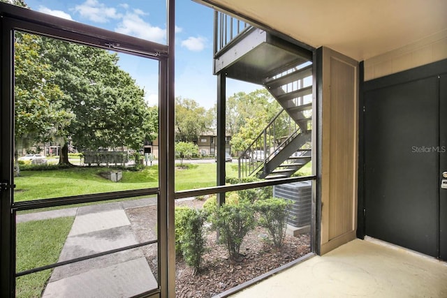 interior space featuring plenty of natural light and concrete floors