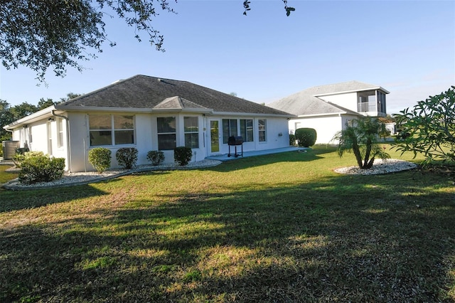 ranch-style home with a front yard