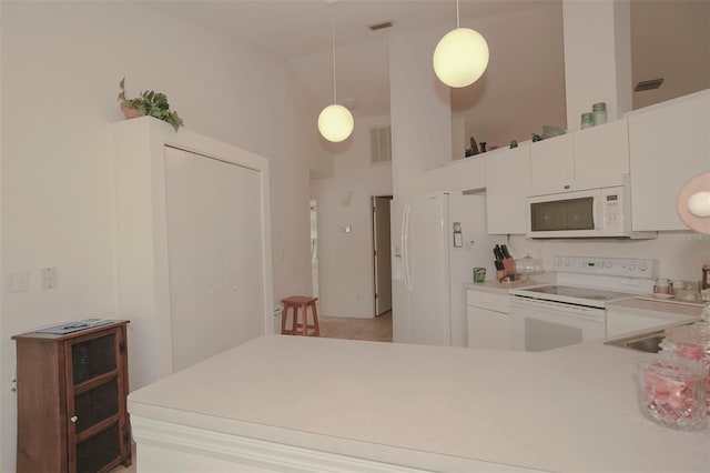 kitchen with pendant lighting, sink, white cabinets, high vaulted ceiling, and white appliances