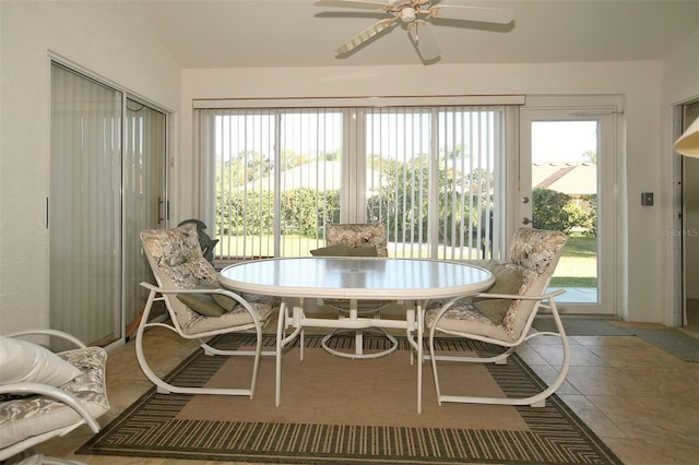 interior space featuring a healthy amount of sunlight, tile patterned flooring, and ceiling fan