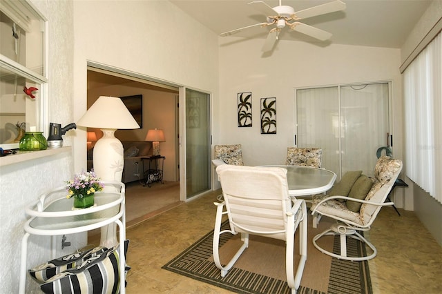 dining room featuring vaulted ceiling and ceiling fan