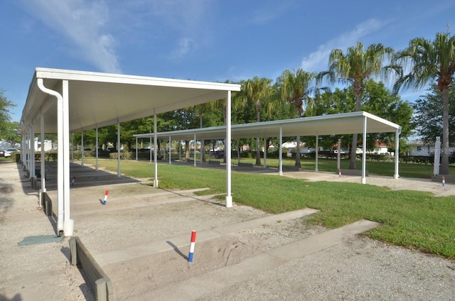 2451 E Del Webb Blvd, Sun City Center, FL 33573 - view of home's community with a lawn
