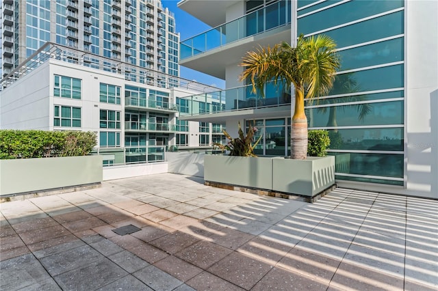 view of patio / terrace with a balcony