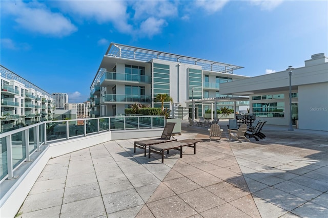 view of patio with a balcony